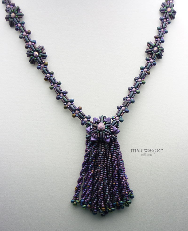 Twisted beaded tassel with magatama drops, beaded beadcap and chain