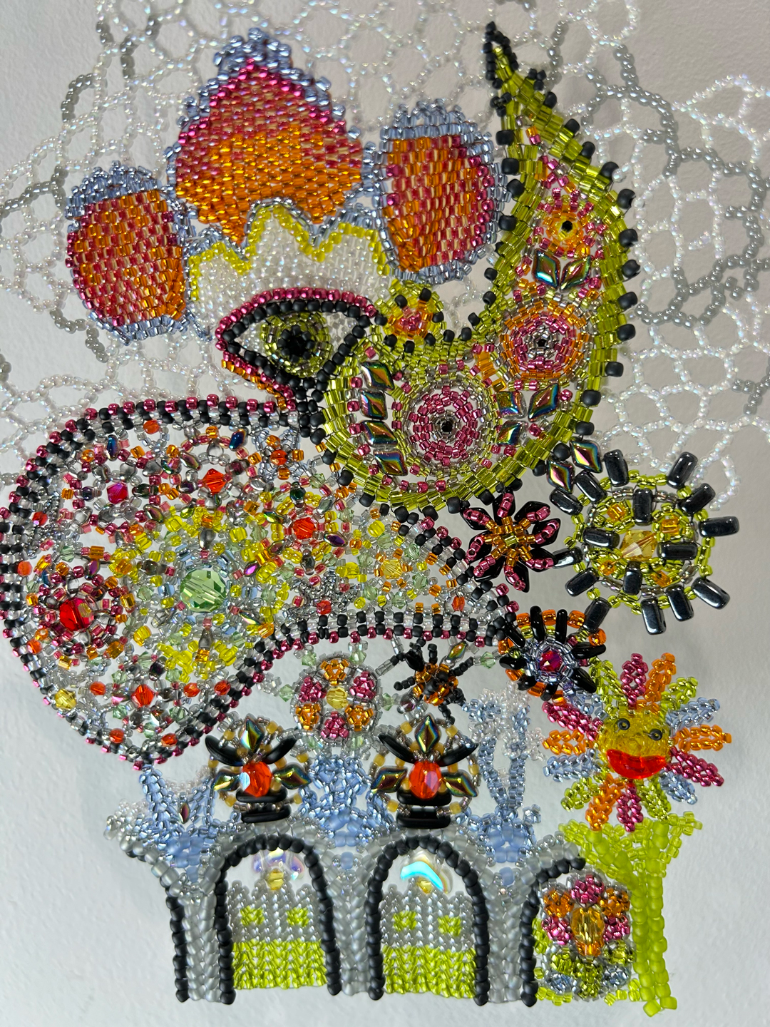 Circular Circular, a beadwork hanging by Mary Yaeger, 